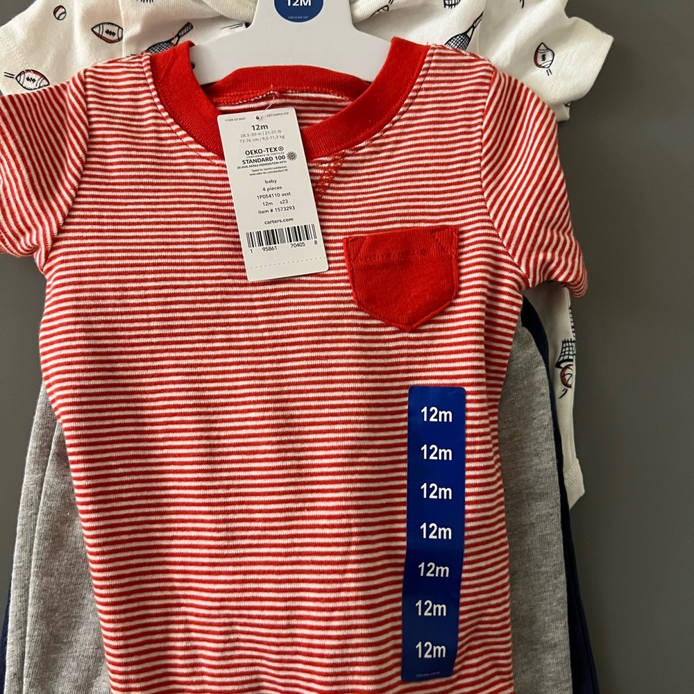 4-piece set for boys from Carter’s Baby. Two onesies and Two pants, Size 12m